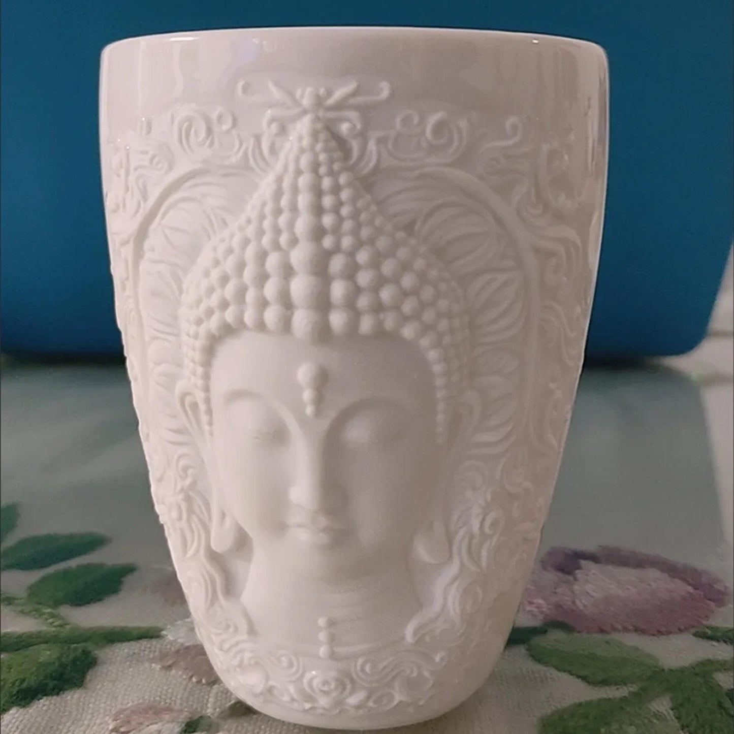 Elegant White Ceramic Buddha Relief Mug