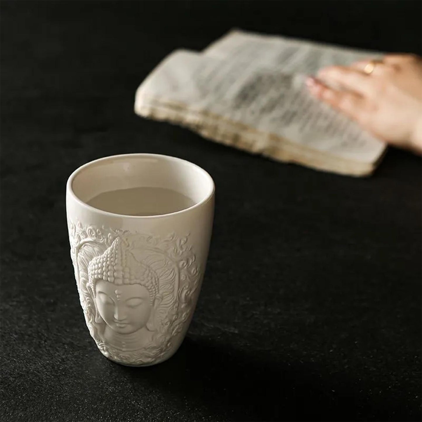 Elegant White Ceramic Buddha Relief Mug
